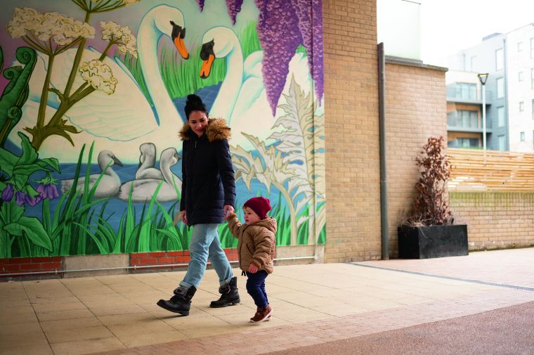 Mother and child walking 