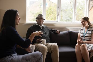 Staff and resident talking