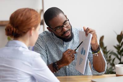 Staff member giving advice at a DOSH Advice Plus meeting